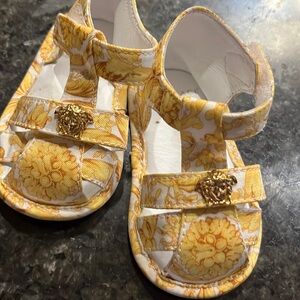 These are a 17 newborn real Versace shoes no stains no damage wore once